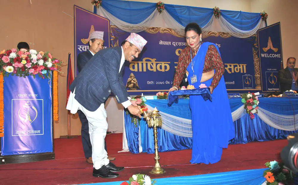 Baikuntha Aryal lighting the lamp at the 15th Annual General Meeting of Nepal Telecom (NTC)