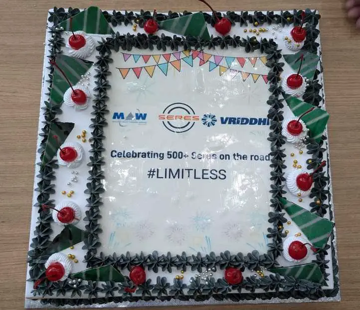 Seres EV cake cutting ceremony 500 sales milestone